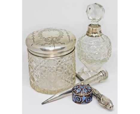 A mixed lot of hallmarked silver comprising a silver topped jar, a cut glass scent bottle with silver collar, a propelling pe