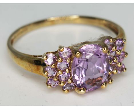 A hallmarked 9ct gold pink stone cluster ring, gross wt.  2.3g, size V, with box.  