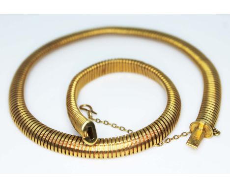 A French hallmarked 18ct gold retro era gas pipe or tubogas necklace, maker's mark indistinct, length 35cm, wt. 23.9g, with a
