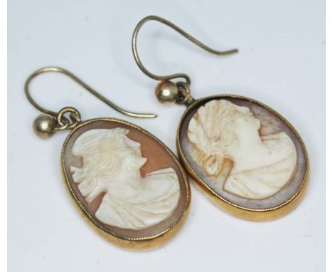 A pair of Victorian cameo earrings, gold mount unmarked, length 17mm (excluding loop), gross wt. 5g, with associated box.  