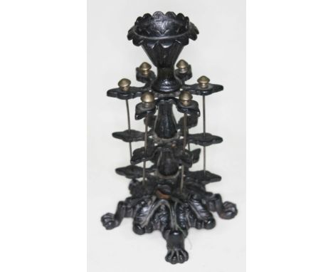 A Victorian cast iron bobbin stand, height 21cm.  