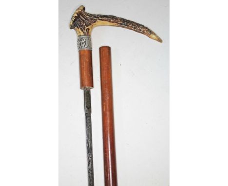 A Victorian malacca sword stick with hallmarked silver mounted antler handle, etched Toledo blade, length 92.5cm.  