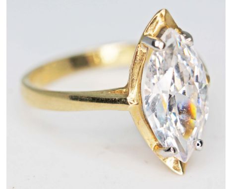 A hallmarked 9ct gold ring set with a marquis cut stone, gross wt. 3.6g, size P.  