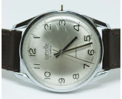 A Corvette incabloc mechanical manual wind wristwatch with silvered dial, black Arabic numbers, and 17 jewel Fontainemelon (F