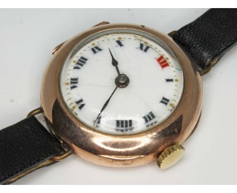 A 1920s 9ct gold Rolex Trench type wristwatch with enamel dial, 15 jewel movement, case diam. 25mm.  Condition - appears in w