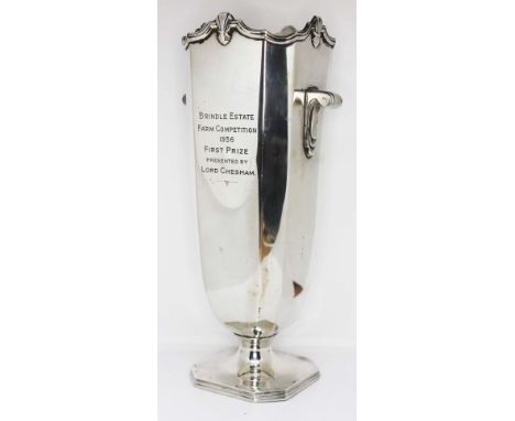 A twin handled Art Deco style hallmarked silver trophy vase inscribed 'Brindle Farm Competition 1936 First Prize Presented by