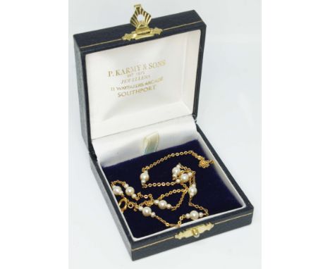 A 9ct gold and pearl necklace, length 44cm, gross wt. 3.1g, with associated box.  