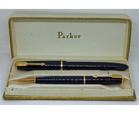 A Parker Duofold 14K gold nib fountain pen and propelling pencil set.  