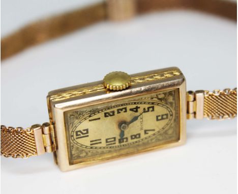 A 1930s Art Deco 9ct gold Rolex cocktail watch with 9ct gold strap, gross wt. 16g.  Condition - appears in working order, gen