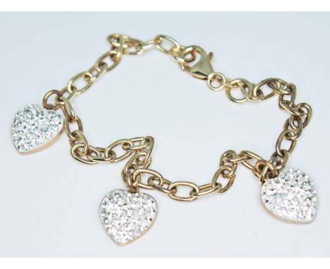 A 9ct gold chain bracelet with three heart shaped charms, marked '375' and with 9ct gold import mark, gross wt. 3.8g, length 
