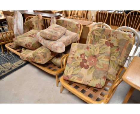 A light Ercol three piece cottage suite