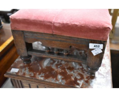 A 19th Century oak footstill with bobbin turned decoration