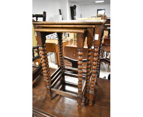 A late 19th or early 20th Century oak nest of three tables, having bobbin turned supports, lovely proportions, approx. H56 W4