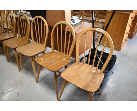 A set of five Ercol low hoop and stick back kitchen dining chairs