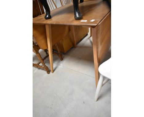 A vintage Ercol Windsor style drop leaf table, approx width 74cm (open length 137cm)
