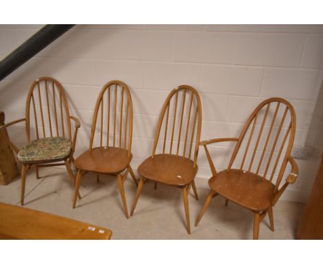 A set of four (two plus two) light Ercol high hoop and stick back dining chairs
