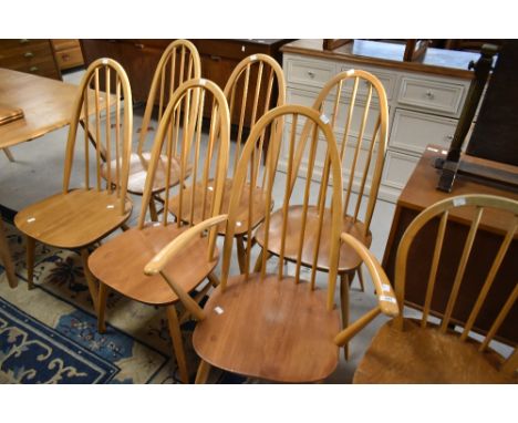 A set of Six (five plus one) Ercol low hoop and stick back kitchen dining chairs
