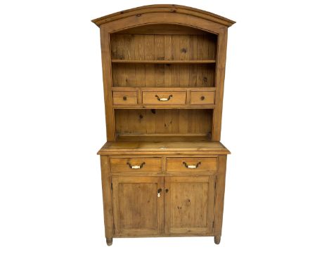 Pine farmhouse style dresser, arched top with projecting cornice over two tier plate rack and three small drawers, base fitte