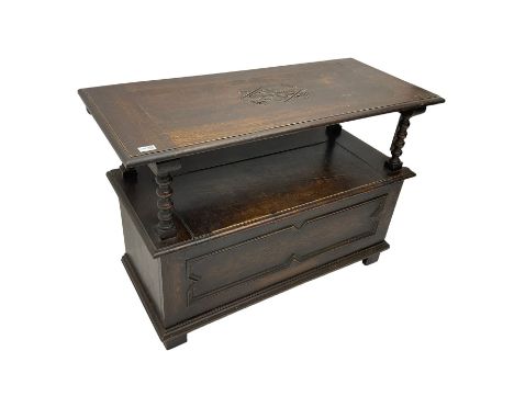 Mid-20th century oak monks bench or settle,  hinged metaphoric table back carved with foliate lozenge decoration, bobbin turn