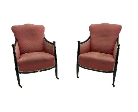 Pair early 20th century armchairs, ebonised frame with ivorine inlay, upholstered in pink fabric with fan design and sprung s