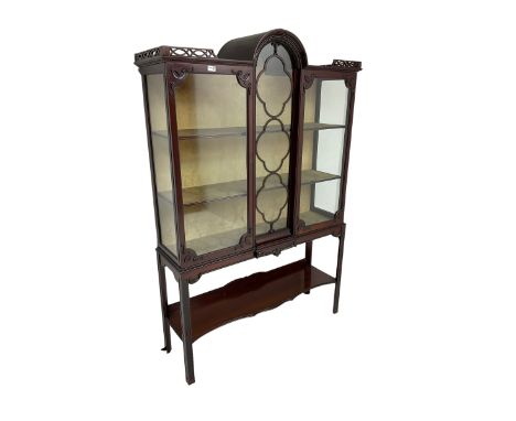 Edwardian mahogany display cabinet, arched top and enclosed by two glazed door, lined interior fitted with two shelves, on sq