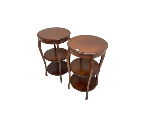 Pair early 20th century mahogany lamp tables, circular moulded top over two tiers, on shaped cabriole uprightsDimensions: Hei