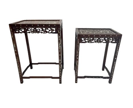 Nest of two mother of pearl inlaid hardwood tables, the rectangular tops decorated with cherry blossom trees and hunter inlay