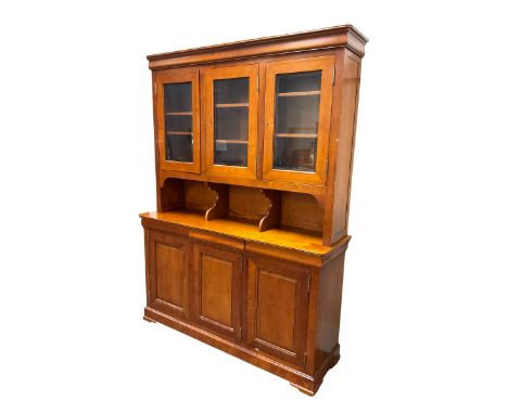 Multi-York -  Loire cherry wood dresser, shaped cornice over three glazed doors enclosing six shelves, the lower section fitt