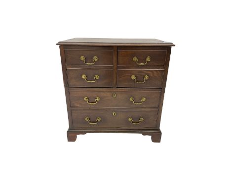 George III mahogany commode chest, hinged top and front, disguised with false drawers, on bracket feetDimensions: Height:&nbs