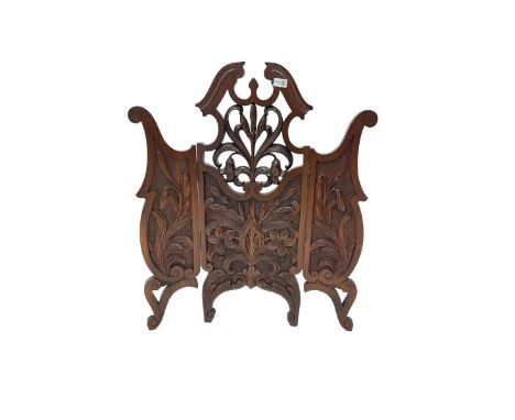 Late 19th century carved mahogany fire screen, broken swan neck pediment with carved and pierced foliate and flower design, r