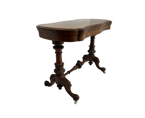 Late 19th century figured walnut card table, shaped hinged swivel top with scrolling satinwood inlay and shaped edge, raised 