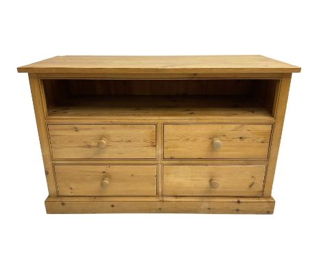 Solid pine media unit, with single shelf and four drawers on plinth baseDimensions: Height:&nbsp;76cm&nbsp; Length/Width:&nbs