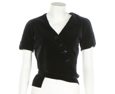 A Chanel black cotton velvet bodice, early 1930s, narrow brown on ivory woven label, wrap-over with asymmetric button closure