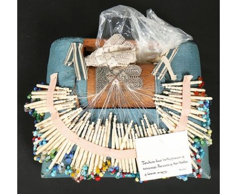 Three bobbin lace pillows, early 20th century, applied with 82 plain bone bobbins, with attached panel of Torchon lace; anoth