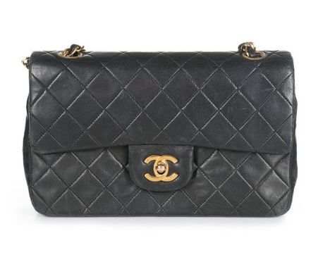 A Chanel black quilted leather 2.55 bag, 1980s-90s, stamped to interior and numbered 1825149, with identification card and du