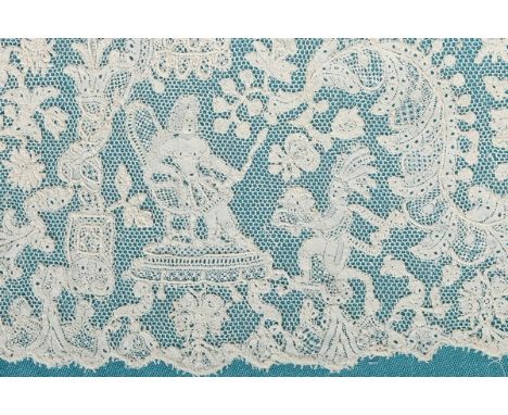 A fine figurative Brussels bobbin lace robings panel, early 18th century, with droschel ground, delicately worked with a king