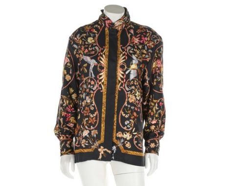 An Hermès 'Pierres d'Orient et d'Occident' by Zoe Pauwels printed silk blouse, 1988, labelled and size 42, with concealed but