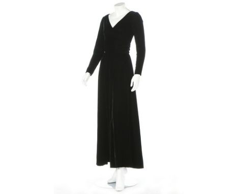 A Christian Dior demi-couture black velvet evening gown, Autumn-Winter 1970, labelled and numbered 152887, with V-neckline an