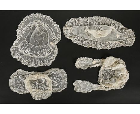 A group of lace and whiteworked bonnets, mainly second half 19th century, approx 15 including four of Brussels Point de Gaze 