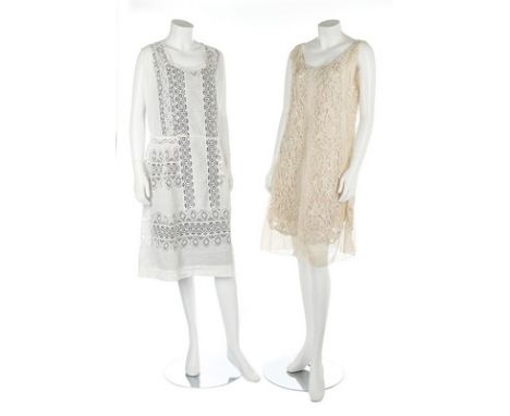 Two dresses of cutwork and chemical lace applique, late 1920s, together with five assorted bodices, 1890s; and a tulle surpli