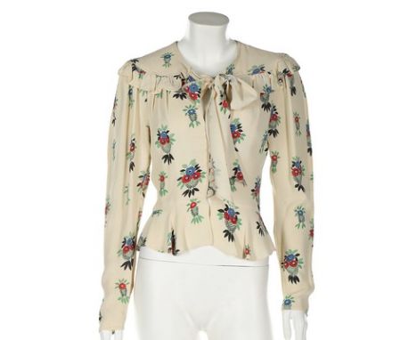 An Ossie Clark for Radley printed moss crepe blouse, mid 1970s, printed satin label, with ruffles to yoke and neck ties, bust