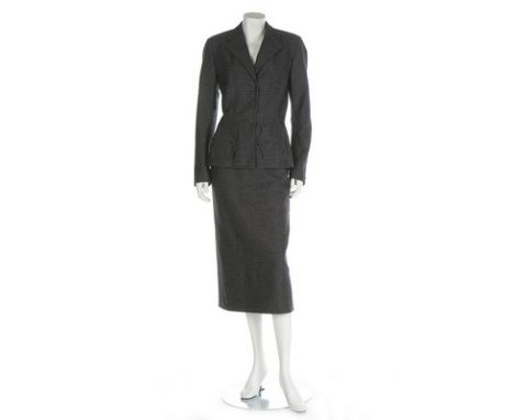 A Digby Morton grey wool pinstripe suit, 1950s, labelled, the jacket with self-covered buttons, two front pockets; matching l