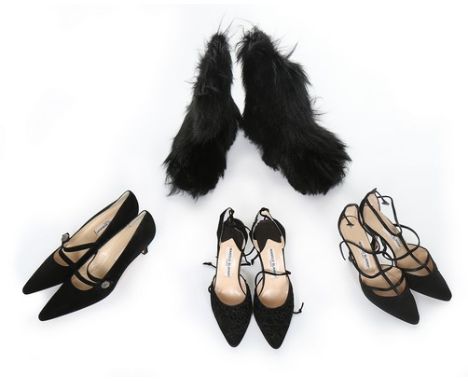 A pair of Manolo Blahnik black 'Yeti' boots, 1990s, entirely covered in mountain goat fur; together with a pair of Manolo Bla
