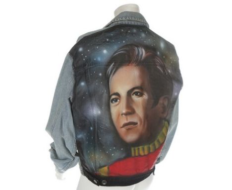 An Alamo Designs 'Captain Kirk' customised Gap denim jacket, circa 1988, indistinctly signed, painted with Star Trek spaceshi