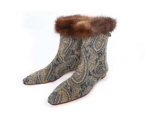 A group of Manolo Blahnik stilettos and ankle boots, 2000s, nine pairs, including a tapestry weave pair trimmed with mink; tw