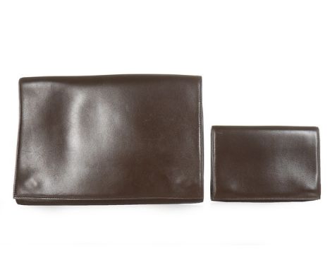 An Azzedine Alaïa brown leather clutch bag, probably 1990s, stamped to interior, with magnetic snap closure, the front flap i