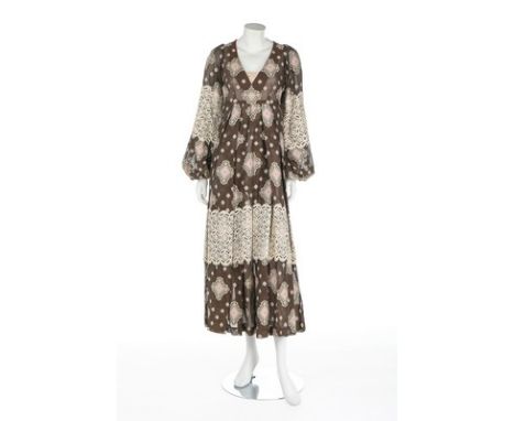 A Thea Porter brocaded cotton dress, mid 1970s, woven lily label, with pink and white woven lozenges, the sleeves and hem ins