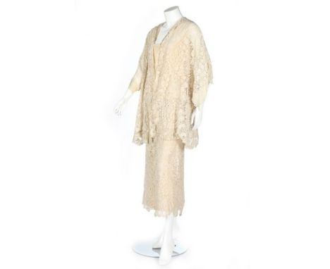 A Brussels mixed lace ensemble, late 19th century, made into a loose fitting jacket and skirt/slip in the 1930's, the jacket 