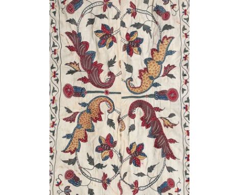 Three pieced panels of finely embroidered linen, Gujarat, late 17th-early 18th century, finely worked in chain stitch with ac