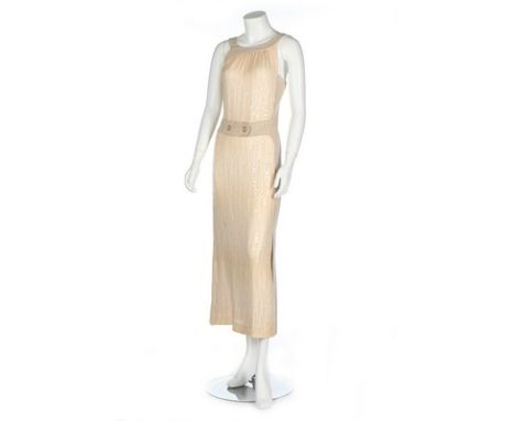 A Chanel beige tweed evening ensemble, 2001, labelled and size 38, the dress with front sequinned chiffon panel and button be